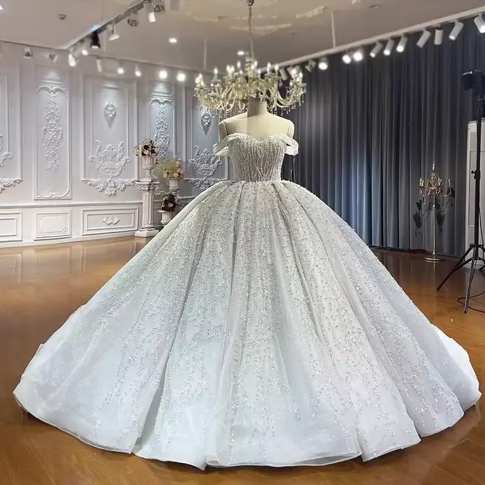 Robe de mariée personnalisée exquise à paillettes, en dentelle et perles, style robe de bal, manches