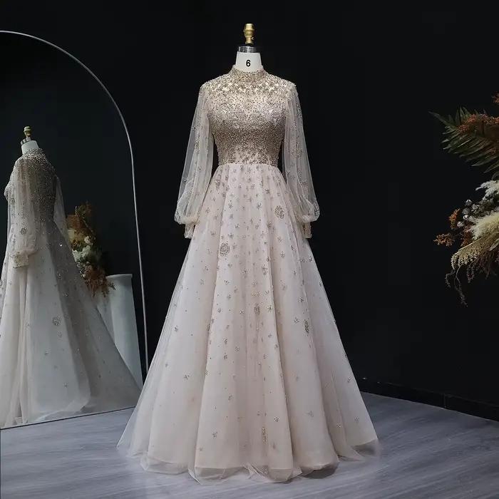 Robe de soirée de luxe Sharon Said Dubai Champagne coupe trapèze avec manches lanterne en cristal, r