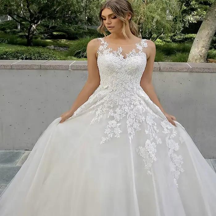 Robe de mariée élégante personnalisée, col rond, avec traîne de balayage, avec des Appliques en dent