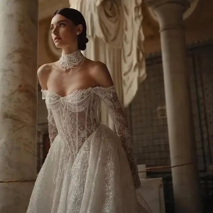 Robe de mariée trapèze en dentelle gracieuse personnalisée, robe de mariée élégante à manches longue