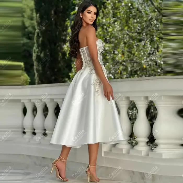 Robes de mariée classiques, coupe trapèze, longueur mi-mollet, avec perles et appliques, style vinta