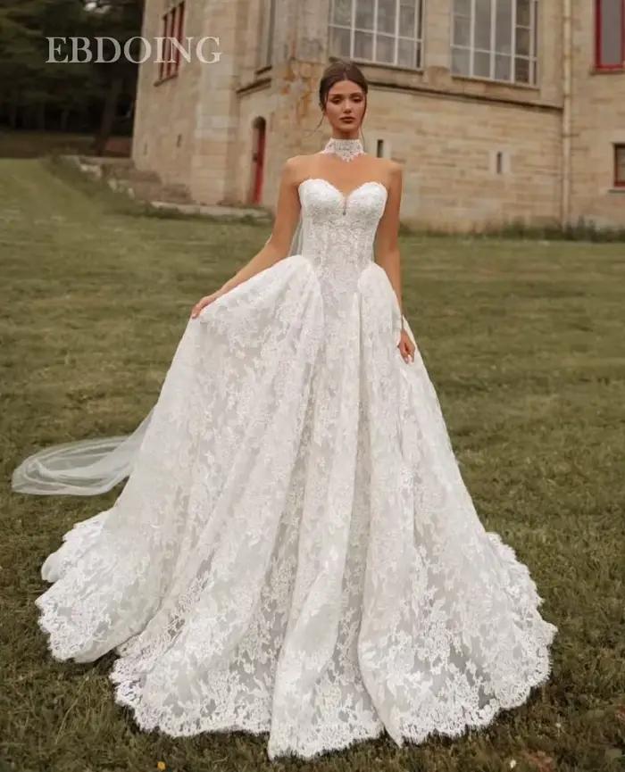 EBDOING robe de mariée a-ligne dentelle décolleté en coeur traîne chapelle avec rabats détachables r
