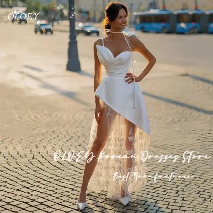 Robe de mariée OLOEY chic ivoire à bretelles spaghetti, en satin drapé, asymétrique, avec appliques 