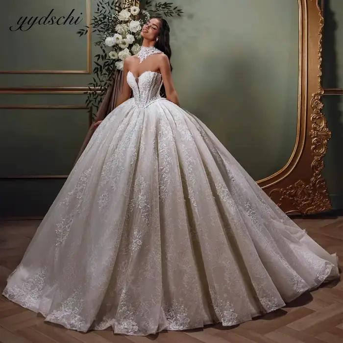 Robe de mariée de luxe personnalisée 2026 Dubaï Ivoire Nouvelle Robe de mariée de luxe à col cœur Ro