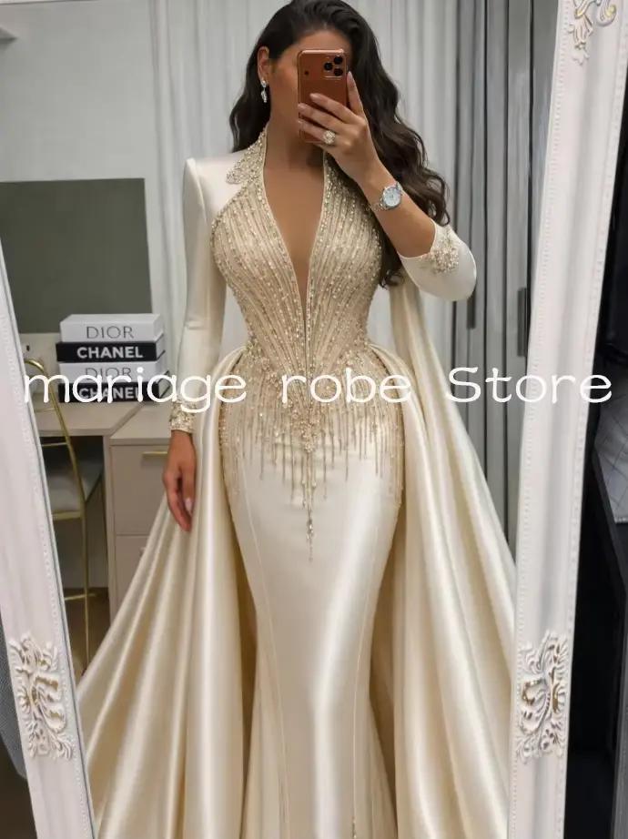 Robe de bal sirène de luxe couleur champagne avec traîne détachable, manches longues ornées de crist