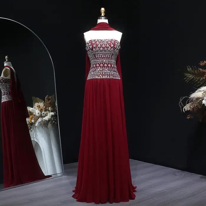 Robe de soirée dos nu Sharon Said Dubai rouge bordeaux avec écharpe en mousseline perlée شارون سعيد 