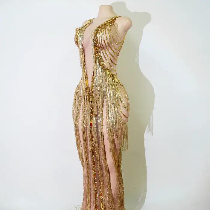 Robe longue de luxe dorée à franges et strass
