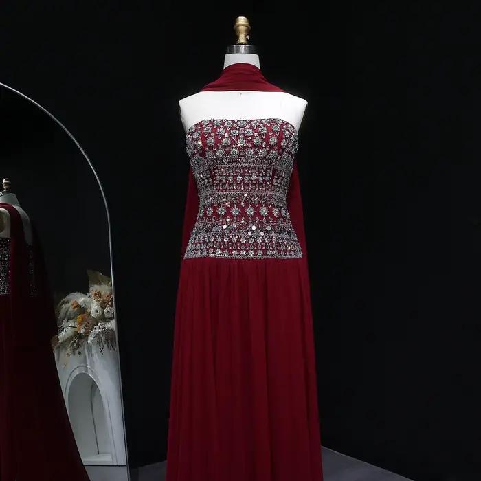 Robe de soirée dos nu Sharon Said Dubai rouge bordeaux avec écharpe en mousseline perlée شارون سعيد