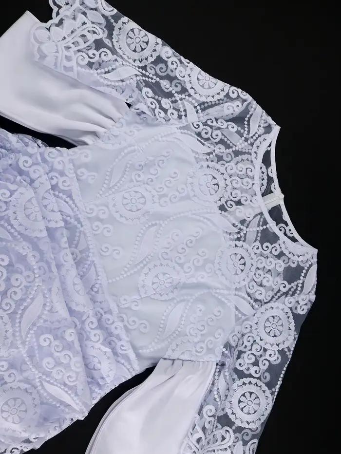 Robe mi-longue brodée à col rond pour femme