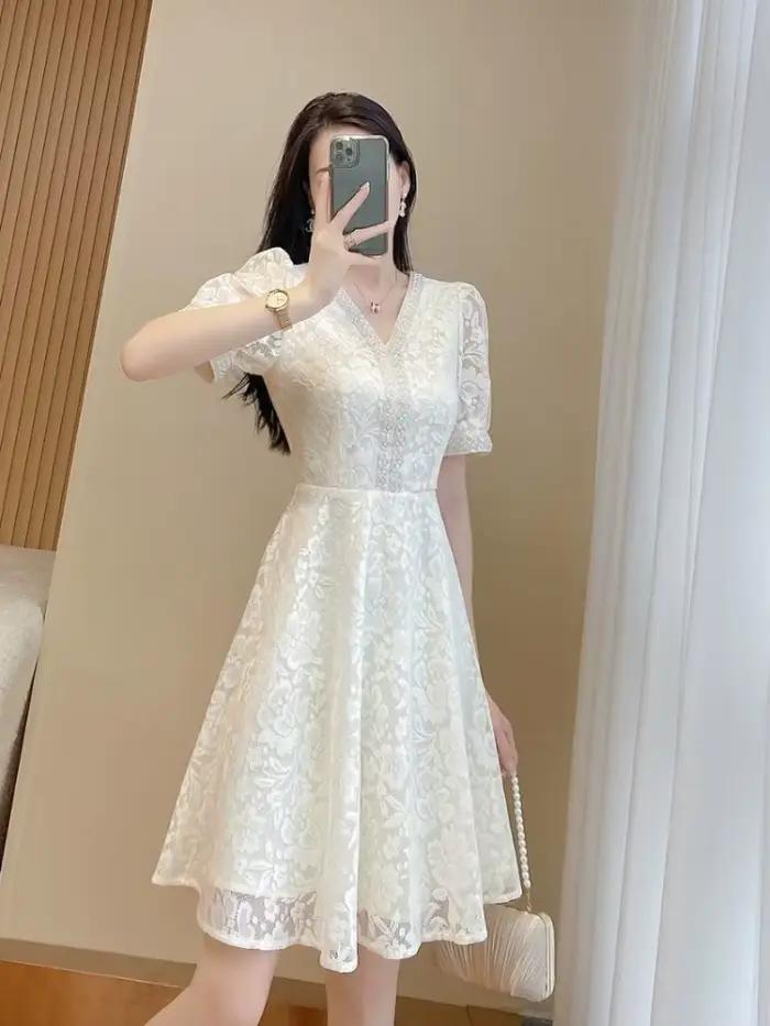 Robe mi-longue blanche pour femme