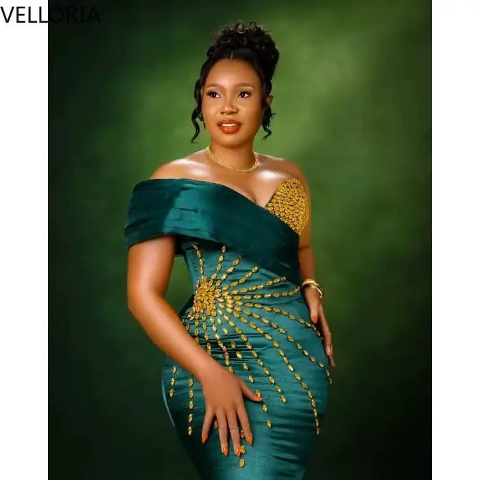 Robe sirène africaine vert émeraude sans manches épaules dénudées perles dorées cristal mariage bal de promo soirée officielle