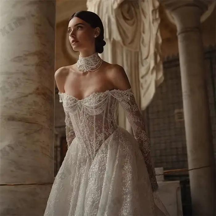 Robes de mariée en dentelle ivoire 2026