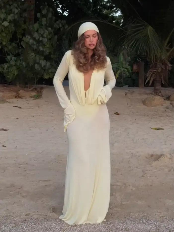 Robe longue sexy en maille transparente à manches longues pour femme