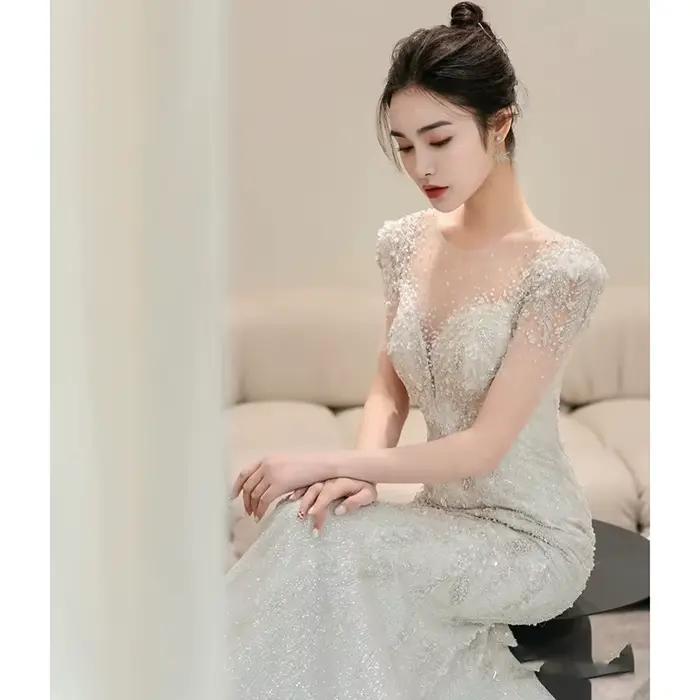 Robe de mariée en queue de poisson