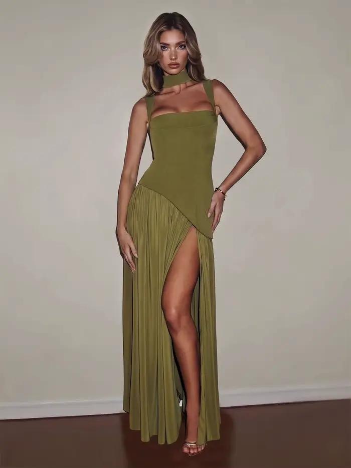 Robe de soirée vert émeraude Sharon Said Dubai Elgangt sans bretelles avec ceinture à la taille et fente haute en