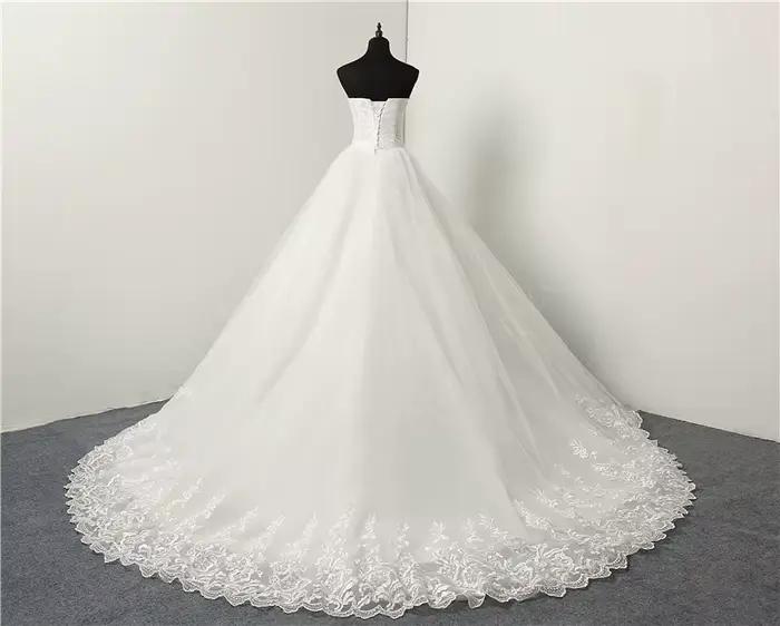 Robe de mariée ivoire sans bretelles à lacets