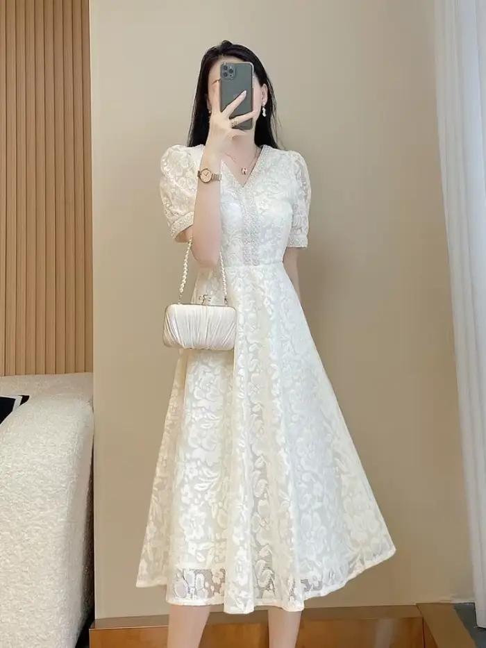 Robe mi-longue blanche pour femme