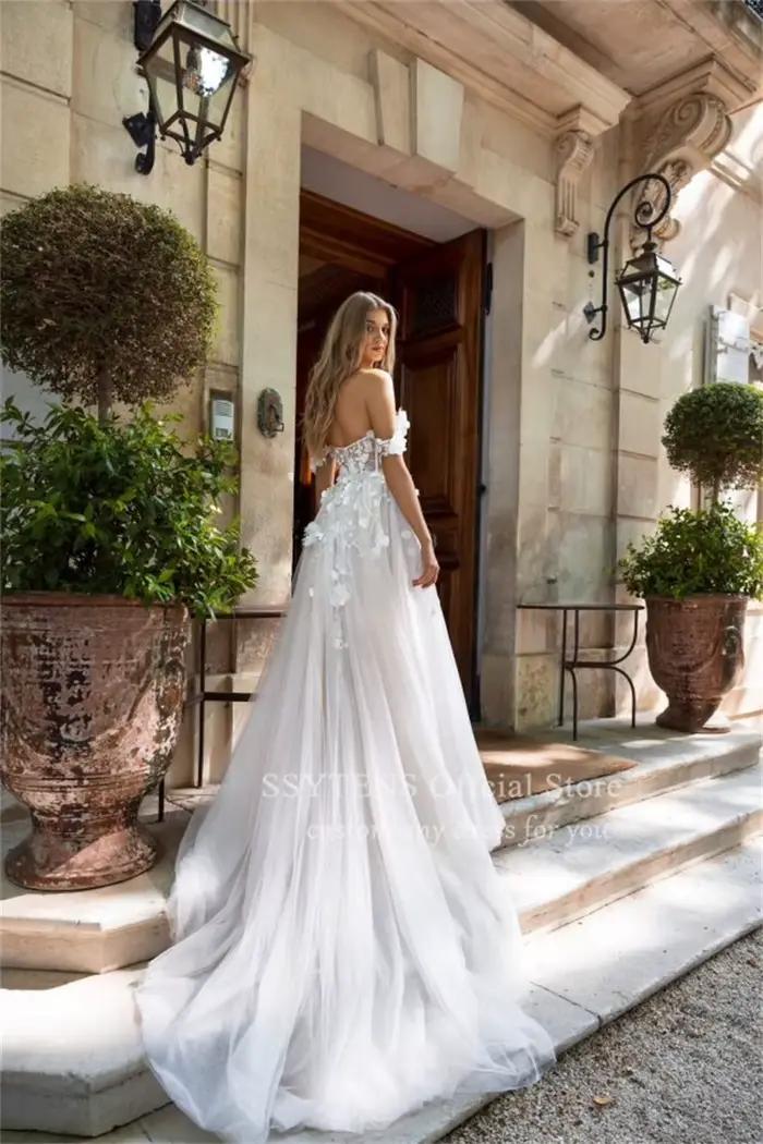 Robes de mariée à fente haute pour femmes