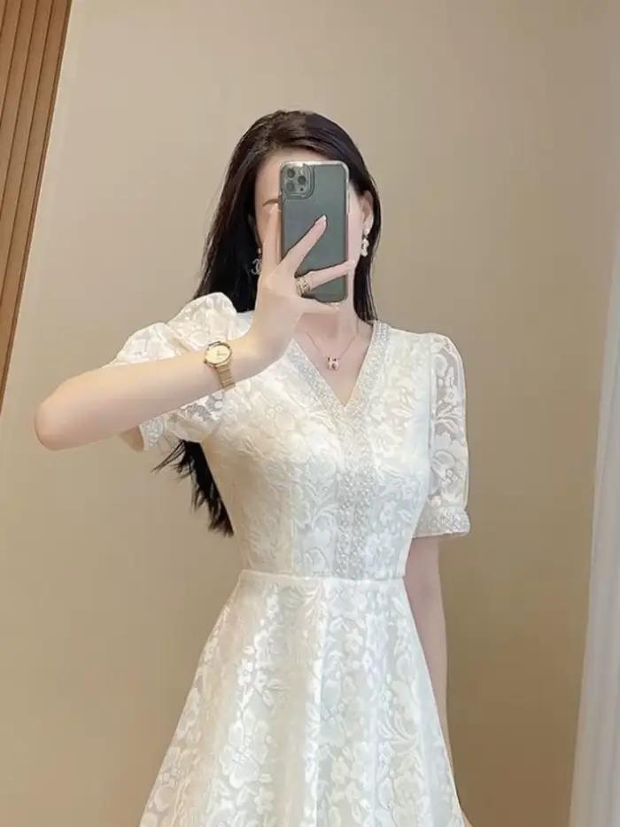Robe mi-longue blanche pour femme