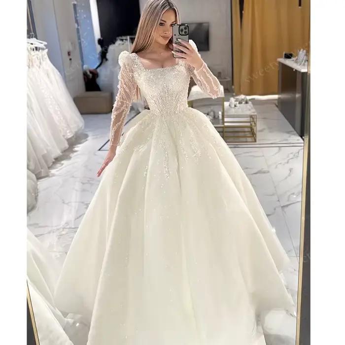 Robe de Mariée ShaLaYIi Trapèze Luxe Brodée Perles Manches Longues Col Carré Train Couronne Occasions Spéciales