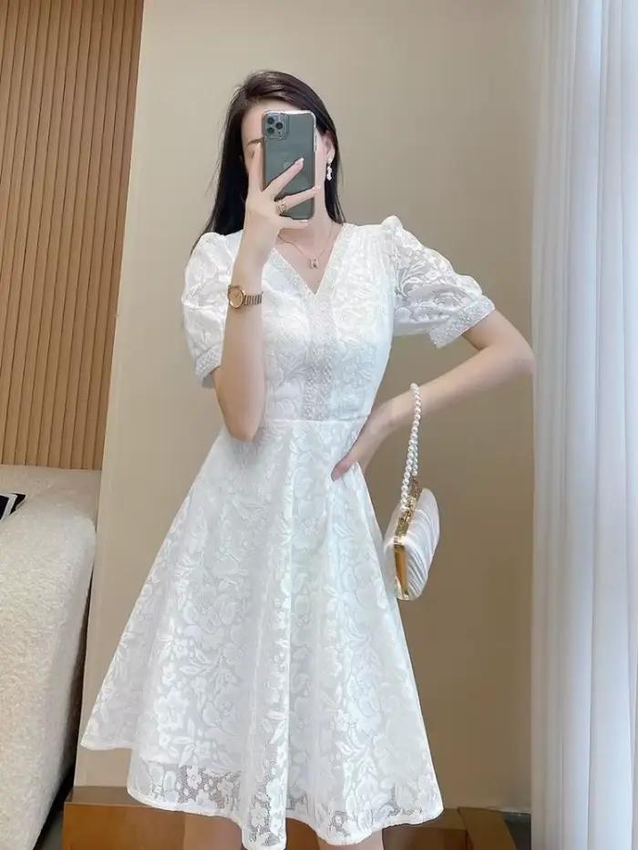 Robe mi-longue blanche pour femme