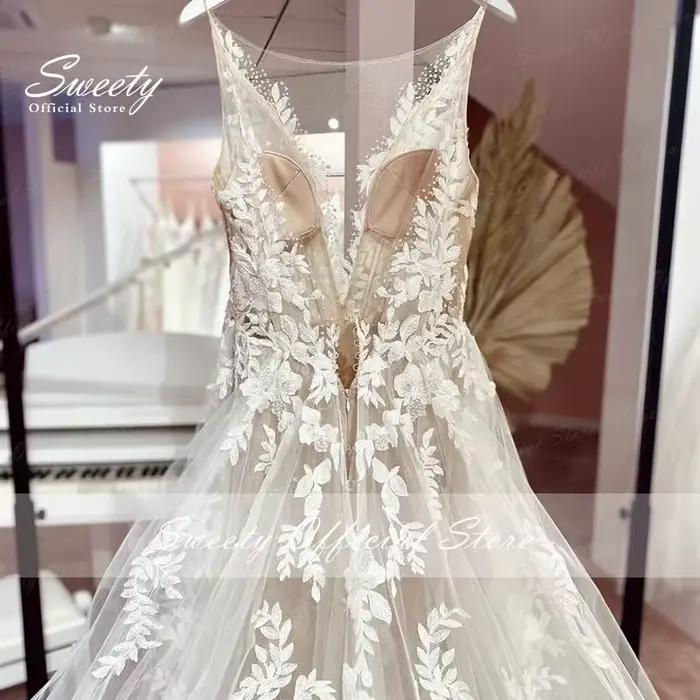 Robe de mariée en organza avec perles brodées