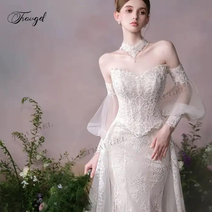 Robe de mariée Traugel élégante à manches longues