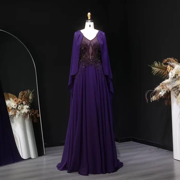 Robe de soirée Sharon Said bleu marine perlée à col en V avec cape en mousseline de soie coupe trapè