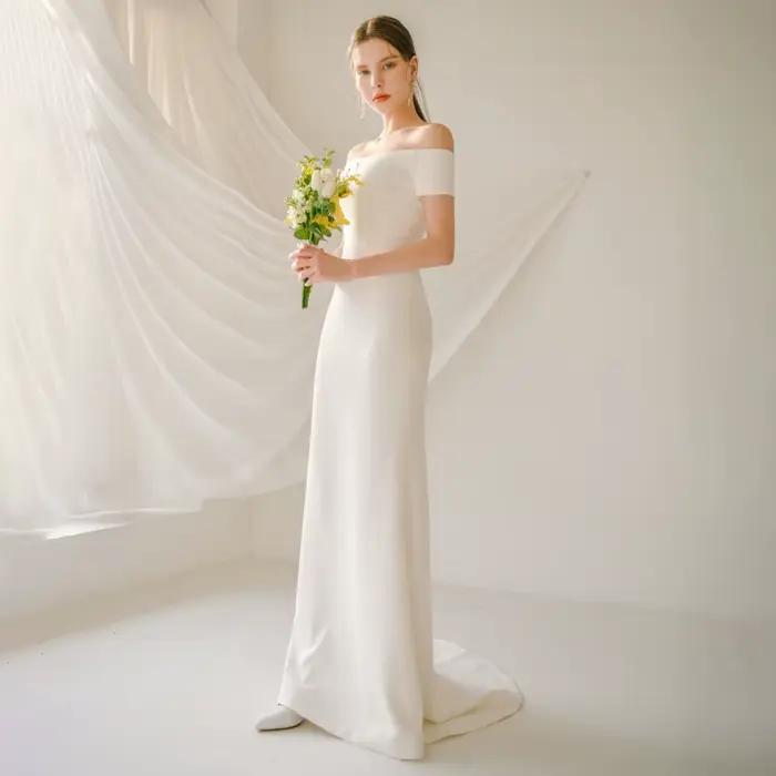 Robe de mariée légère française, asymétrique épaule dénudée, voile d'extérieur, tempérament de Banqu