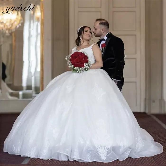 Robes de mariée de luxe en tulle brillant ivoire 2026, col en V, sans manches, avec appliques en den