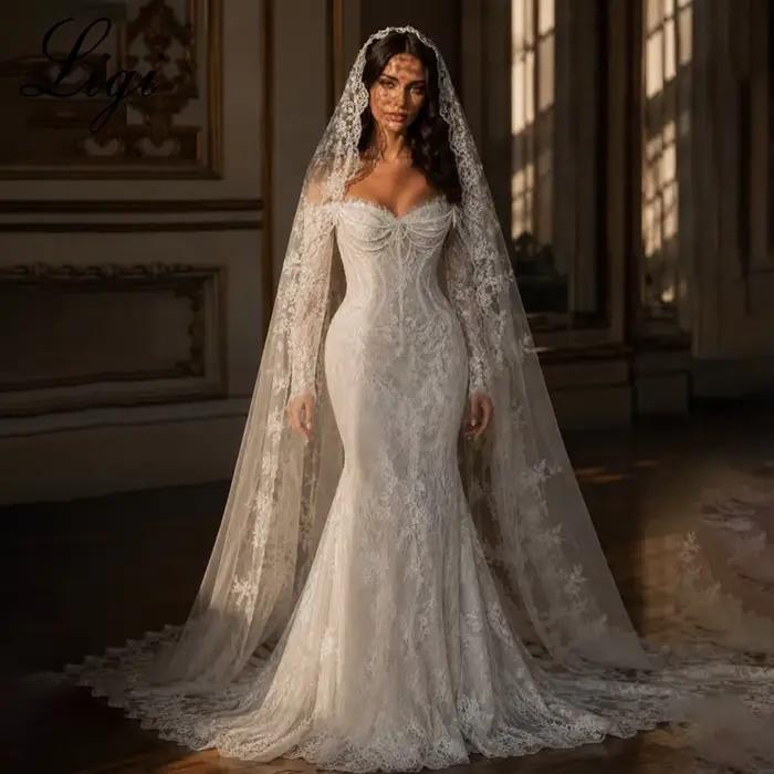 Robes de mariée sirène de luxe LIGI en dentelle intégrale, épaules dénudées, manches longues, style