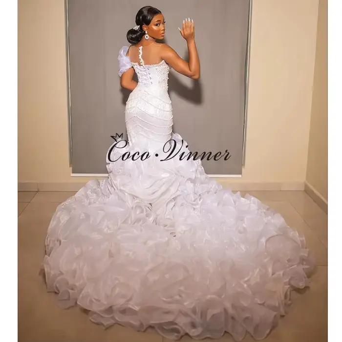Robe de mariée sirène personnalisée avec traîne à volants