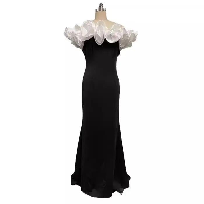 Robe longue noire transfrontalière
