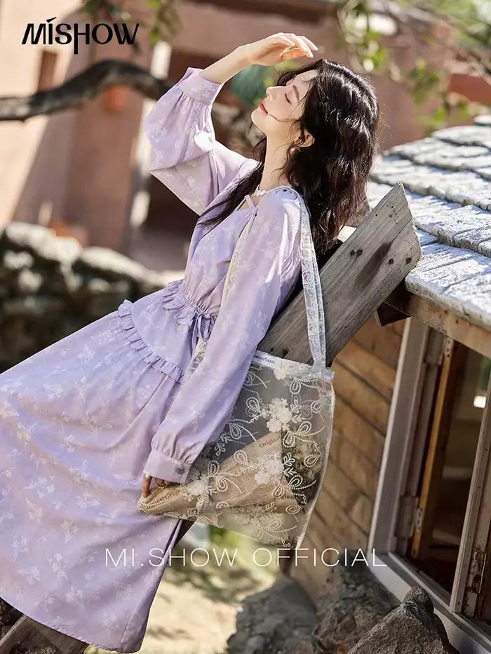 Robe noire élégante à manches longues pour femme