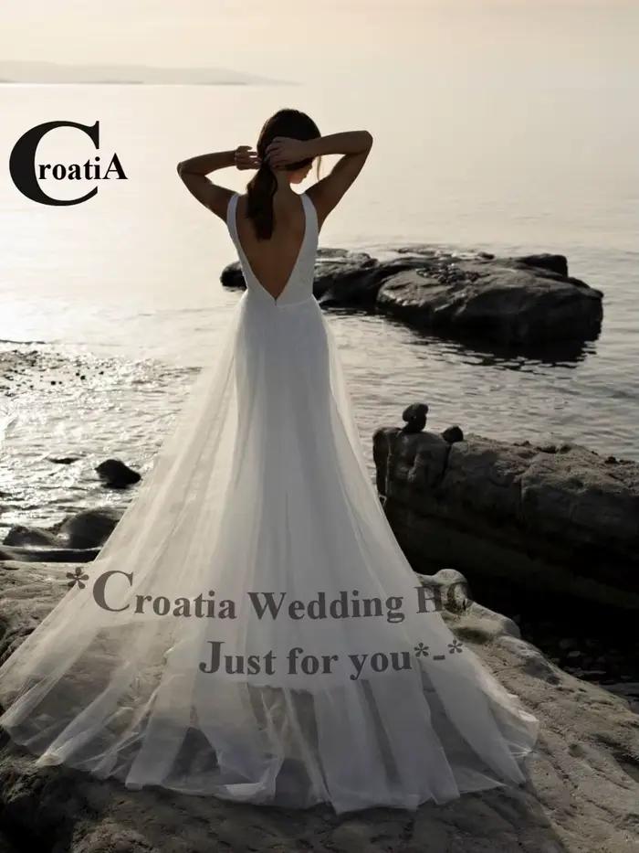 Robe de mariée dos nu avec appliques en satin sirène