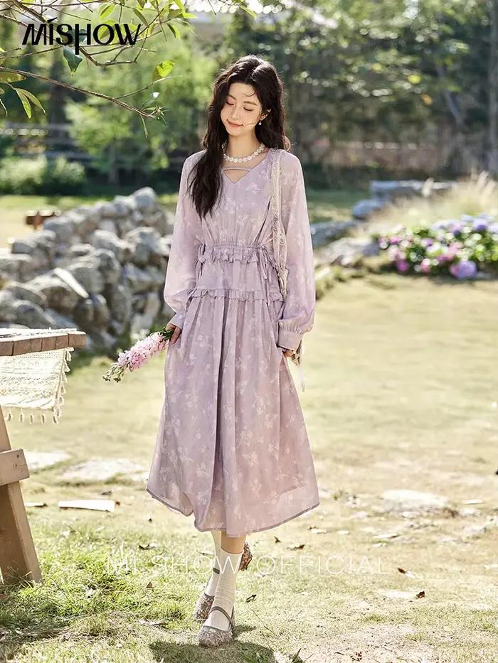Robe noire élégante à manches longues pour femme