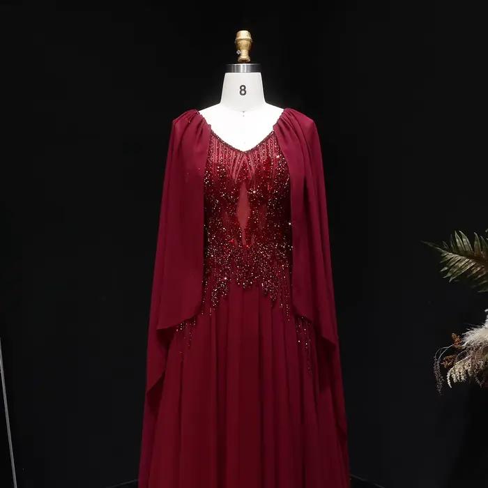 Robe de soirée Sharon Said bleu marine perlée à col en V avec cape en mousseline de soie coupe trapèze شارون سعيد