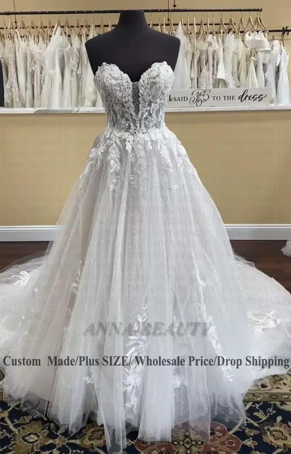 Anna attrayant chérie robe De mariée plissée a-ligne sans manches balayage Train dentelle Appliques Vestido De Casamento personnalisé