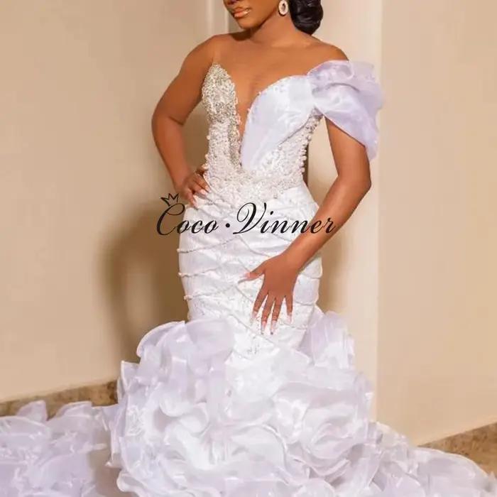 Robe de mariée sirène personnalisée avec traîne à volants