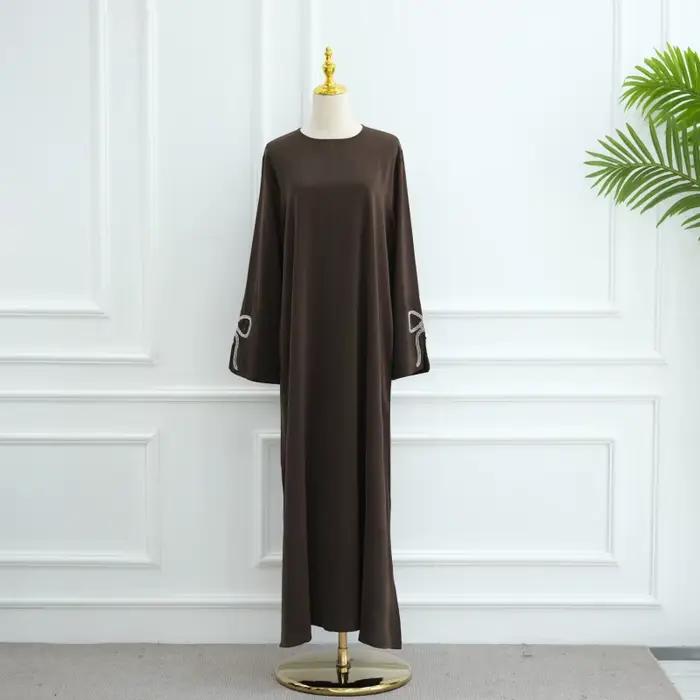 Abaya pour femme élégante polyester tricotée avec arc décoration pour occasions spéciales automne hiver
