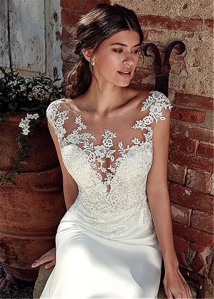Robe de mariée sirène en dentelle avec appliques
