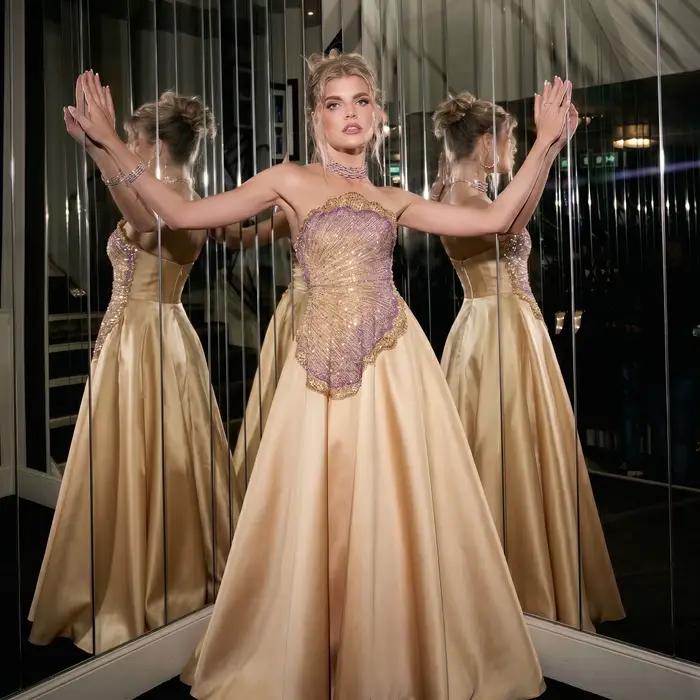 Robe de soirée trapèze sans bretelles Sharon Said Dubai Luxury Gold avec gants perlés شارون سعيد