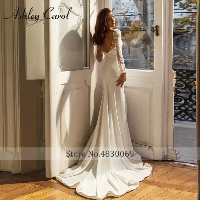 Ashley Carol robe De mariée sirène délicate perlée paillettes col en v