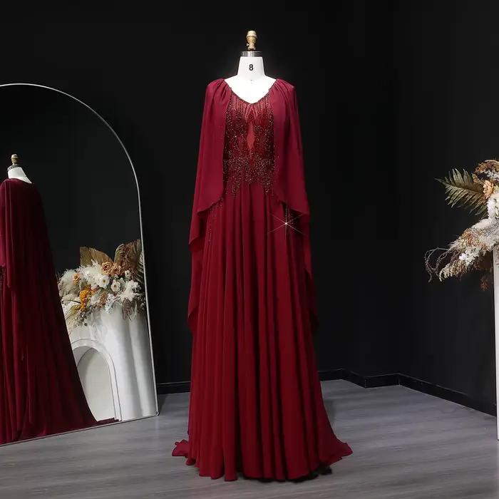 Robe de soirée Sharon Said bleu marine perlée à col en V avec cape en mousseline de soie coupe trapèze شارون سعيد