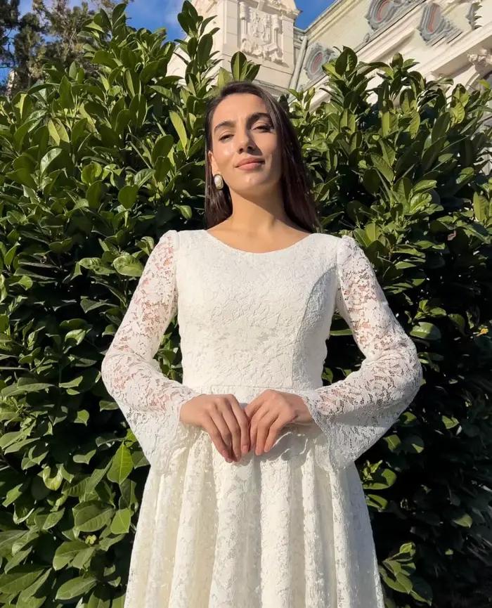 Robes de mariée personnalisées élégantes en dentelle à manches longues pour femmes