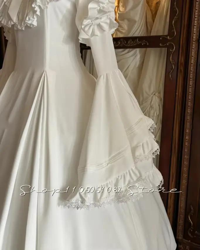 Robe de mariée blanche victorienne