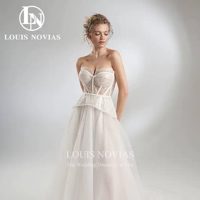 Robe de mariée trapèze, torsadée, élégante, sexy, perlée, pailletée