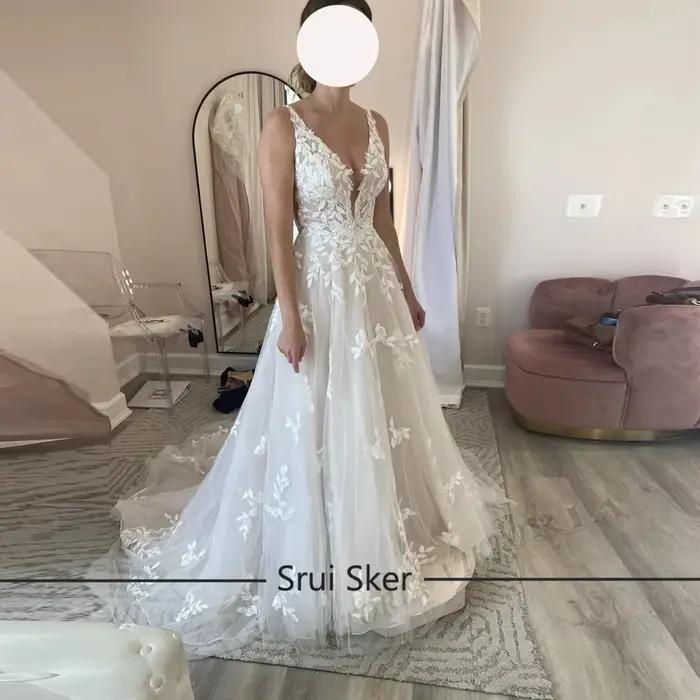 Robe de mariée classique en tulle et dentelle avec appliques