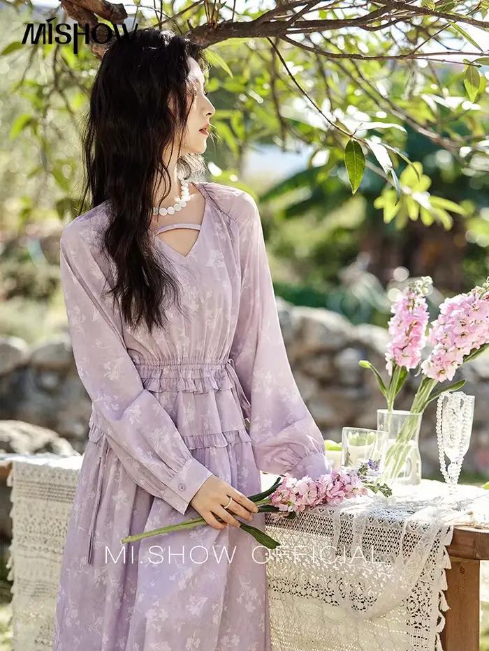 Robe noire élégante à manches longues pour femme