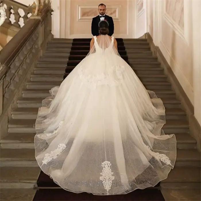 Robes de mariée de luxe en tulle brillant ivoire 2026